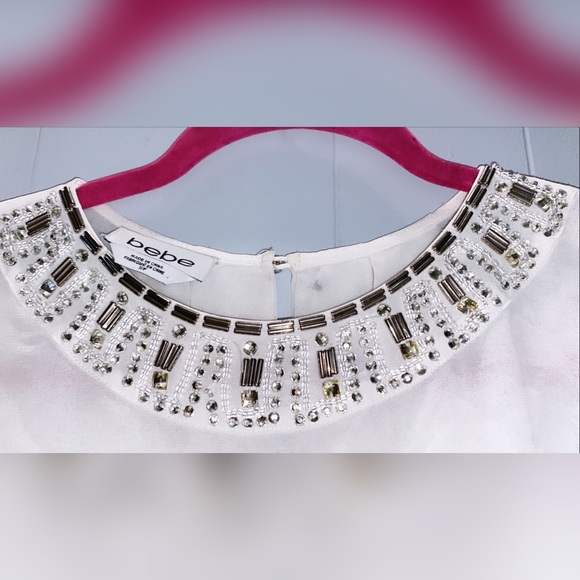 Bebe White Sleeveless Blouse - Picture 2 of 3